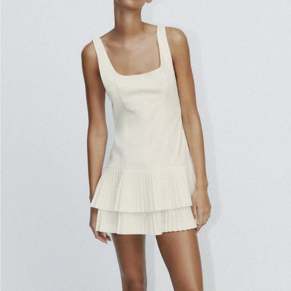 Elegant Cream Sleeveless Dress